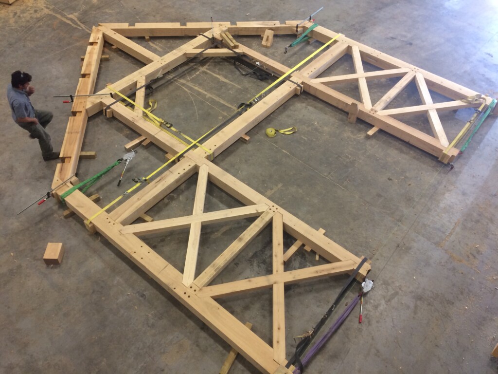 timber frame bent fit up with X-bracing